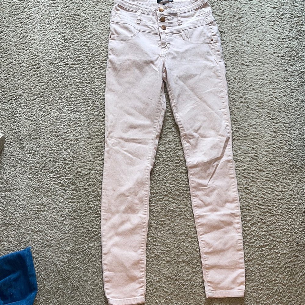 Blush skinny jeans